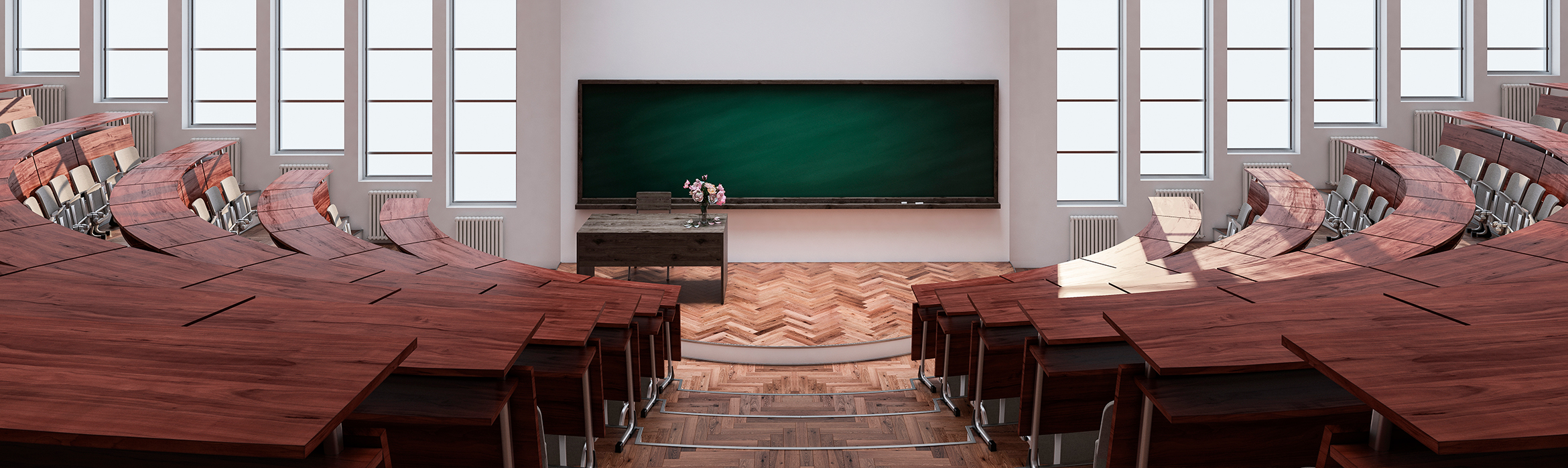 Interior de un auditorio con mesas de madera